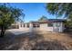 Backyard and exterior of home featuring a back patio at 5112 Londonderry Blvd, Orlando, FL 32808
