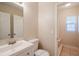 Bathroom with tiled shower, vanity sink, and comfort height toilet at 5112 Londonderry Blvd, Orlando, FL 32808