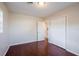 Bedroom with wood-look floors, double closets and natural light at 5112 Londonderry Blvd, Orlando, FL 32808