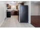 Functional kitchen featuring dark cabinets and updated appliances for the home chef at 5112 Londonderry Blvd, Orlando, FL 32808