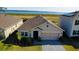 House with lake view and solar panels on nearby house at 523 Lazio Cir, Debary, FL 32713