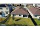 Aerial view showcasing the home's backyard and neighborhood at 523 Lazio Cir, Debary, FL 32713