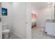 Bathroom featuring tile floors, a white toilet, and a shower with a decorative curtain at 523 Lazio Cir, Debary, FL 32713
