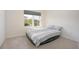 Bedroom featuring a window with shade and a view to the outdoors at 523 Lazio Cir, Debary, FL 32713