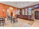 Community clubhouse bar with seating and a welcoming atmosphere at 523 Lazio Cir, Debary, FL 32713