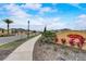 Community entrance with signage and landscaping, welcoming residents and guests at 523 Lazio Cir, Debary, FL 32713