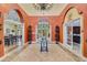 Elegant community clubhouse lobby with comfortable seating and high ceilings at 523 Lazio Cir, Debary, FL 32713