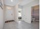 Entrance foyer leading to a bedroom and bathroom at 523 Lazio Cir, Debary, FL 32713