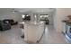 Open-concept living space showcasing the kitchen island, living area, and seamless flow for modern living at 523 Lazio Cir, Debary, FL 32713