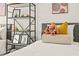 bedroom with a bed, shelving unit, and stuffed animal at 6113 Chorus Dr, Mascotte, FL 34753