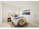 Spacious bedroom with a king-size bed, plush bedding, and calming color scheme at 6113 Chorus Dr, Mascotte, FL 34753