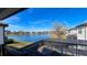 Community view of a lake with fountain and homes at 7613 Wandering Way, Orlando, FL 32836