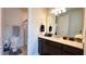 Clean bathroom with single vanity and shower at 7613 Wandering Way, Orlando, FL 32836