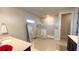 Main bathroom with double vanity and walk-in shower at 7613 Wandering Way, Orlando, FL 32836