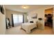 Bedroom with a full-size bed and walk-in closet at 7613 Wandering Way, Orlando, FL 32836