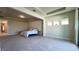 Bright and airy main bedroom with ample space and carpet flooring at 7613 Wandering Way, Orlando, FL 32836