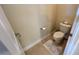 Convenient powder room with toilet and rug at 7613 Wandering Way, Orlando, FL 32836