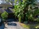 Community overview showcasing waterfront property and mature trees at 7616 Spring Bay Cv # S, Orlando, FL 32819