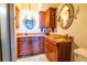 Bathroom with granite vanity and updated cabinets at 7616 Spring Bay Cv # S, Orlando, FL 32819