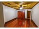 Spacious bedroom with hardwood floors and ceiling fan at 7616 Spring Bay Cv # S, Orlando, FL 32819