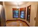 Bright breakfast nook with tile flooring and two windows at 7616 Spring Bay Cv # S, Orlando, FL 32819