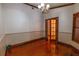 Bright dining room with hardwood floors and French doors at 7616 Spring Bay Cv # S, Orlando, FL 32819