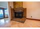 Close-up of a brick fireplace in the living room at 7616 Spring Bay Cv # S, Orlando, FL 32819