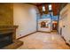 Spacious living room featuring a fireplace and high ceilings at 7616 Spring Bay Cv # S, Orlando, FL 32819