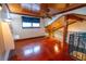 Spacious loft bedroom with hardwood floors and wood ceiling at 7616 Spring Bay Cv # S, Orlando, FL 32819