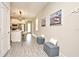 Bright hallway that flows into the kitchen at 7958 Delwin Ln, Kissimmee, FL 34747