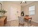 Office with desk, a comfortable chair and plants in the corner offering the perfect work environment at 7958 Delwin Ln, Kissimmee, FL 34747