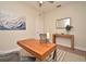 Office space featuring a modern desk, neutral walls and artwork, perfect for a home office or study at 7958 Delwin Ln, Kissimmee, FL 34747