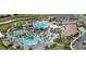 Aerial view showing the expansive pool area and community features at 8828 Cruden Bay Ct, Davenport, FL 33896