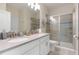 Double vanity and walk-in shower at 8828 Cruden Bay Ct, Davenport, FL 33896