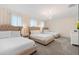 Three twin-size beds in a well-lit room at 8828 Cruden Bay Ct, Davenport, FL 33896