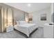 Elegant bedroom with king-size bed and TV at 8828 Cruden Bay Ct, Davenport, FL 33896