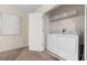Convenient laundry room with washer and dryer at 8828 Cruden Bay Ct, Davenport, FL 33896
