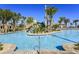 Resort-style pool with a waterslide and plenty of space for lounging at 8828 Cruden Bay Ct, Davenport, FL 33896