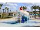 Fun spray park with colorful slides and water features for  at 8828 Cruden Bay Ct, Davenport, FL 33896