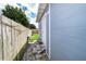 Private backyard with wooden fence and detached workshop at 901 S Solandra Dr, Orlando, FL 32807