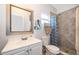 Bathroom with shower, vanity, and updated fixtures at 901 S Solandra Dr, Orlando, FL 32807