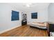 Spacious bedroom with a queen bed and plenty of closet space at 901 S Solandra Dr, Orlando, FL 32807