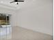 Spacious bedroom with sliding glass doors to backyard at 13497 Se 100Th Ave, Belleview, FL 34420