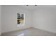 Bright bedroom with ceiling fan and window at 13497 Se 100Th Ave, Belleview, FL 34420