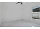 Bedroom with ceiling fan and window at 13497 Se 100Th Ave, Belleview, FL 34420