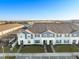 Townhouses with landscaped yards and community amenities at 1366 Lava Tree Dr, Davenport, FL 33897