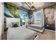Two twin beds in a themed bedroom with mural and unique ceiling at 1366 Lava Tree Dr, Davenport, FL 33897