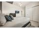 Bedroom with queen bed, closet, and dresser at 1366 Lava Tree Dr, Davenport, FL 33897