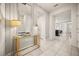 Bright entryway with a gold console table and a large mirror at 1366 Lava Tree Dr, Davenport, FL 33897