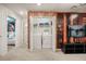 Convenient laundry closet with washer, dryer, and shelving at 1366 Lava Tree Dr, Davenport, FL 33897